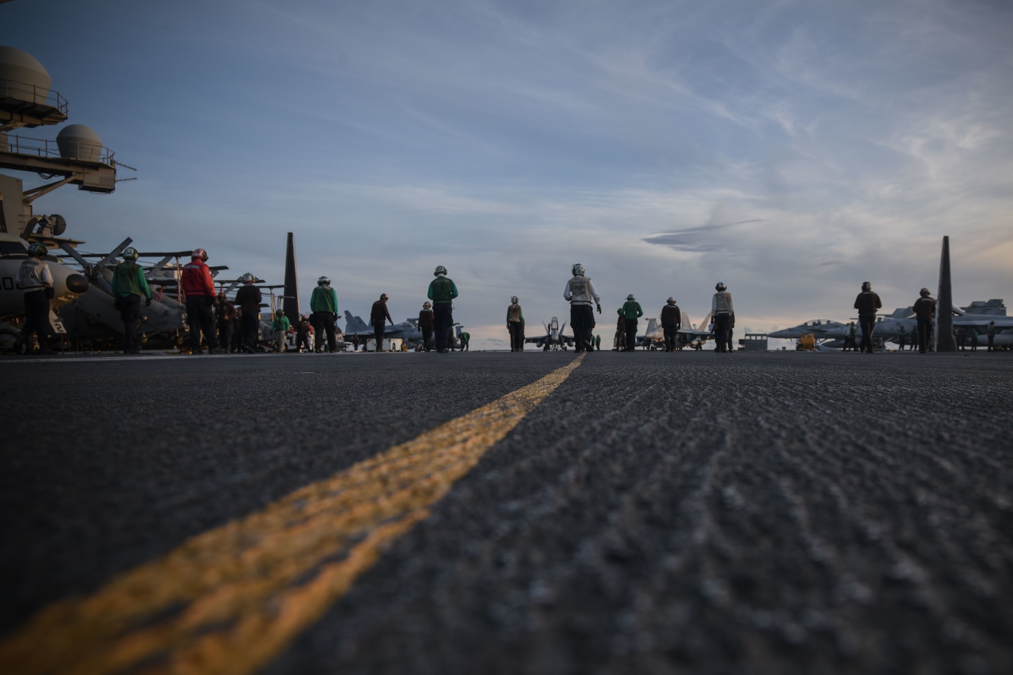 PHILIPPINE SEA (July 1, 2020) Sailors conduct a foreign object debris walkdown on the flight deck of the Navy’s only forward-deployed aircraft carrier USS Ronald Reagan (CVN 76) maintaining Ronald Reagan’s tactical presence on the seas. Ronald Reagan is the flagship of the Reagan Carrier Strike Group (CSG). The USS Nimitz (CVN 68) and Ronald Reagan CSGs are conducting dual-carrier operations in the Philippine Sea as the Nimitz Carrier Strike Force.