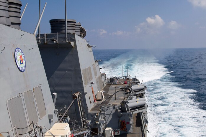 The Arleigh Burke-class guided-missile destroyer USS Cole (DDG 67) fires a Phalanx Close-In Weapons System during a live-fire exercise.