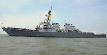 More than 100 midshipmen man the rails for a photo on the forecastle of the guided-missile destroyer USS Cole (DDG 67) during the 2016 Professional Training for Midshipmen (PROTRAMID) Surface week.