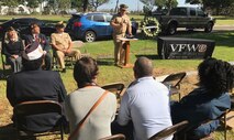 Cmdr. Chris Farricker, commanding officer of Littoral Combat Ship Crew 106, delivers remarks during the memorial of Seaman Lakiba Nicole Palmer.