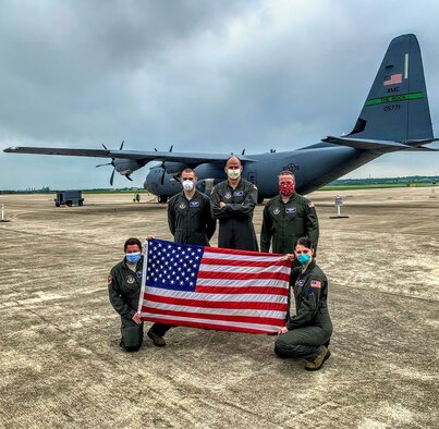 (Upper left) U.S. Air Force Staff Sgt. Timothy Congo, an aeromedical evacuation technician with the 439th Aeromedical Evacuation Squadron, poses for a photo with other 439th AES members April 11, 2020, at Kelly Airfield in Joint Base San Antonio-Lackland, Texas. Aeromedical evacuation members are responsible for providing patient medical care in-flight. (Courtesy photo)