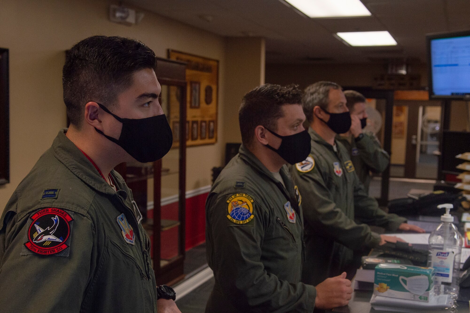 A photo of Airmen receiving a briefing