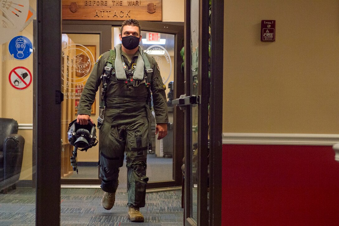 A photo of a pilot walking