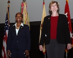 (From left) Delia Adams and Stephanie Hoehne at their retirement ceremony at the Joint Base San Antonio Fort Sam Houston Theater. The U.S. Army Installation Management Command said goodbye to the two members of the Senior Executive Service June 25.