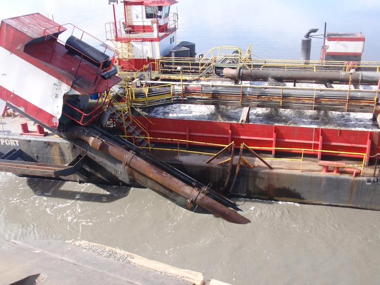 Sand, sediment and debris are removed from the seafloor by the Westport, a hopper dredge operated by Manson Construction, near the Port of Alaska on April 8, 2019.