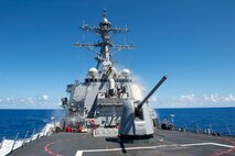 Guided-missile destroyer USS Cole (DDG 67) tests the countermeasure wash-down system. Cole is conducting routine training and operations in preparation for an upcoming deployment with the George H.W. Bush Strike Group.