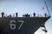 Sailors assigned to Arleigh Burke-class, guided-missile destroyer USS Cole (DDG 67) prepare to depart Naval Station Norfolk. Cole departed Naval Station Norfolk for a scheduled deployment to the 5th and 6th fleet areas of responsibility.