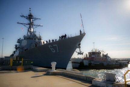Sailors assigned to Arleigh Burke-class, guided-missile destroyer USS Cole (DDG 67) prepare to depart Naval Station Norfolk.