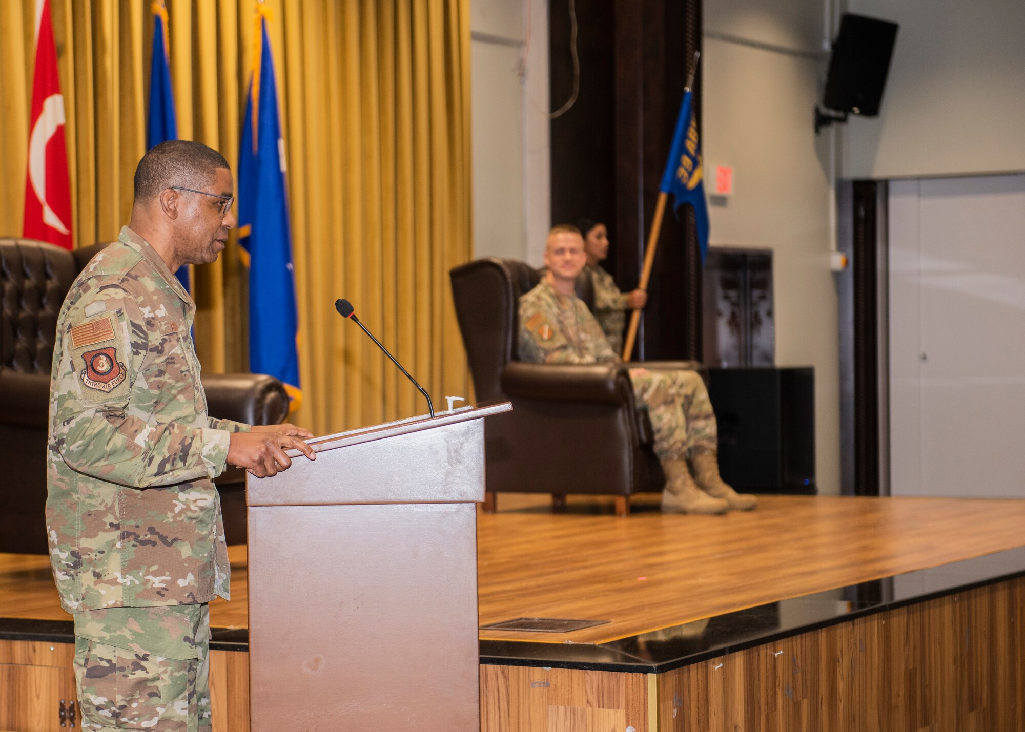Photo of an Airmen giving a speech