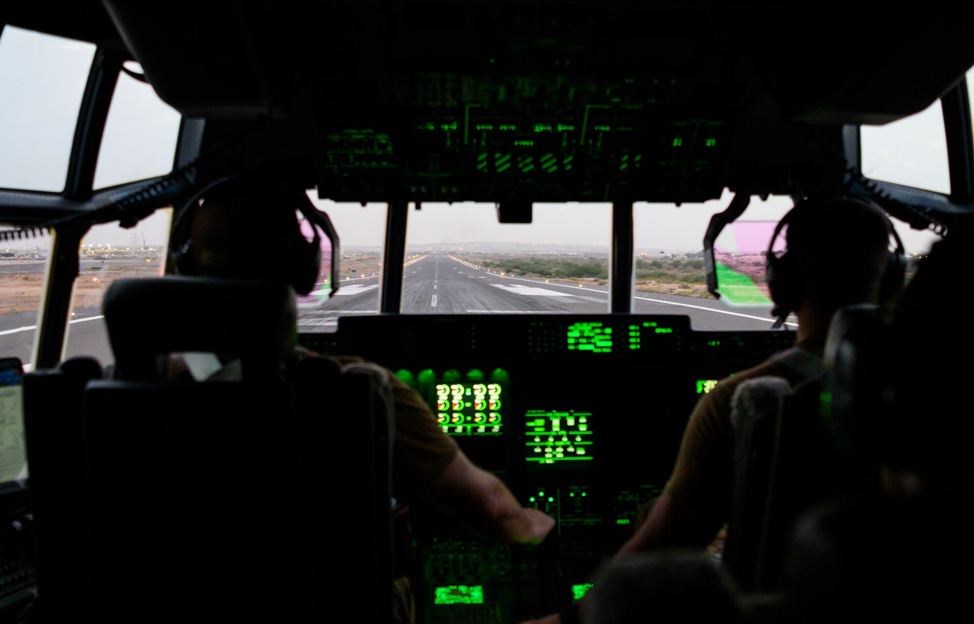 U.S. Air Force 75th Expeditionary Airlift Squadron (EAS) pilots prepare for takeoff on a C-130J Super Hercules at Camp Lemonnier, Djibouti, June 28, 2020. The 75th EAS provides strategic airlift capabilities across the Combined Joint Task Force - Horn of Africa (CJTF-HOA) area of responsibility. (U.S. Air Force photo by Tech. Sgt. Christopher Ruano)