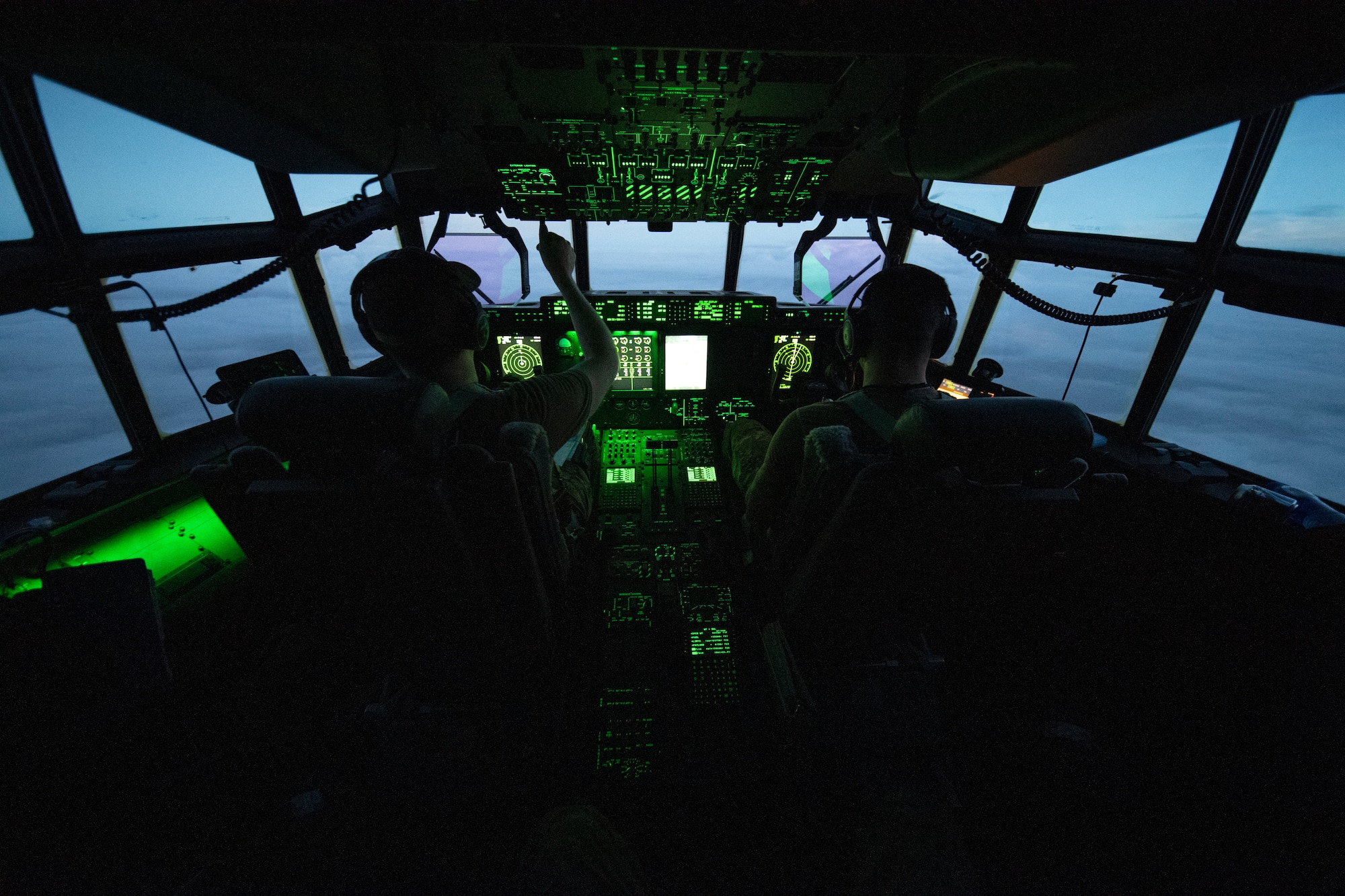 U.S. Air Force 75th Expeditionary Airlift Squadron (EAS) pilots fly a C-130J Super Hercules over East Africa, June 28, 2020. The 75th EAS provides strategic airlift capabilities across the Combined Joint Task Force - Horn of Africa (CJTF-HOA) area of responsibility. (U.S. Air Force photo by Tech. Sgt. Christopher Ruano)