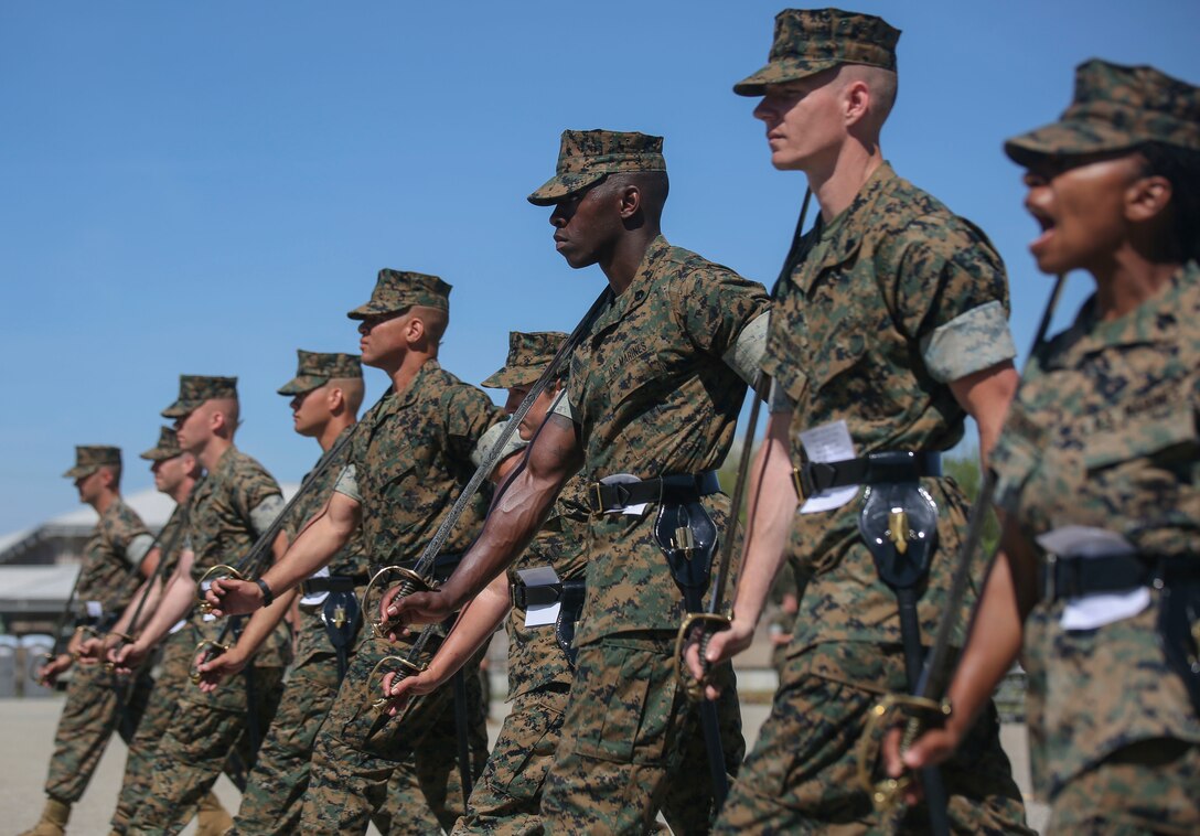 Marine instructors with Drill Instructor School aboard Marine Corps Recruit Depot Parris Island instruct and mentor Drill Instructor School candidates during close order drill practice on Parris Island, S.C. April 17, 2019. Close order drill is one foundation of discipline and esprit de corps in the United States Marine Corps. Additionally, it is one of the oldest methods for developing confidence and troop leading abilities in a Marine Corps unit's subordinate leaders.
(U.S. Marine Corps photo by Sgt. Dana Beesley)