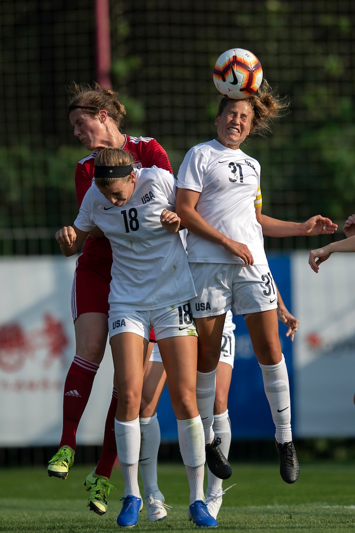 U.S. Air Force Capt. Leah McNell of the U.S. Armed Forces Women’s Soccer Team heads a ball ball during a preliminary game with Germany in the 2019 CISM Military World Games in Wuhan, China Oct. 17, 2019. The Council of International Sports for the Military games open Oct. 18, 2019 and close Oct. 28, 2019. (DoD photo by EJ Hersom)