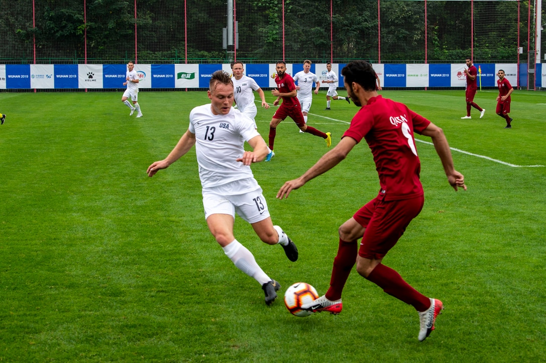 The U.S. Armed Forces Men’s Soccer Team plays Qatar in their first preliminary round of the CISM 2019 Military World Games in Wuhan, China Oct. 16, 2019. The Council of International Sports for the Military games open Oct. 18, 2019 and close Oct. 28, 2019. (DoD photo by Mass Communication Specialist 1st Class Ian Carver/RELEASED)