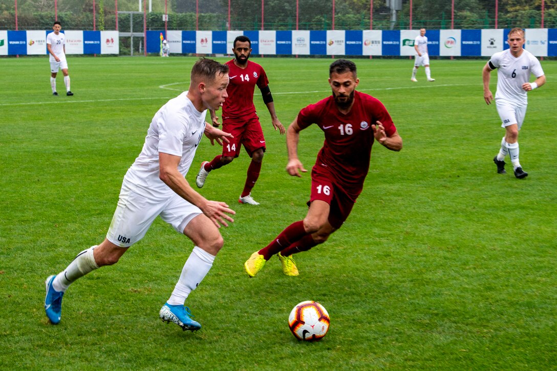 The U.S. Armed Forces Men’s Soccer Team plays Qatar in their first preliminary round of the CISM 2019 Military World Games in Wuhan, China Oct. 16, 2019. The Council of International Sports for the Military games open Oct. 18, 2019 and close Oct. 28, 2019. (DoD photo by Mass Communication Specialist 1st Class Ian Carver/RELEASED)