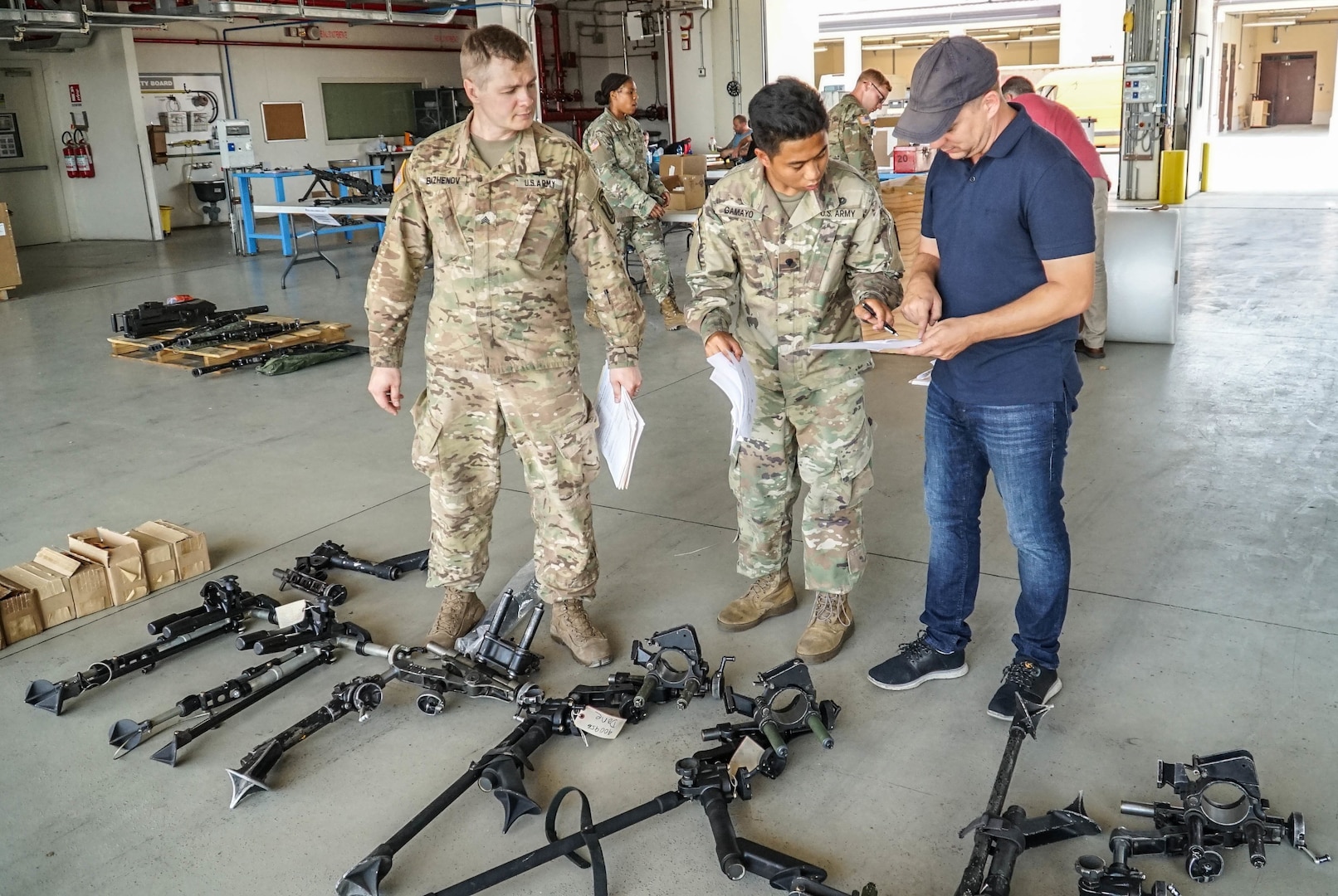 Sky Soldiers from 173rd IBCT (Airborne) lay out equipment for turn-in during Task Force Harvest at Caserma Del Din in Vicenza, Italy.