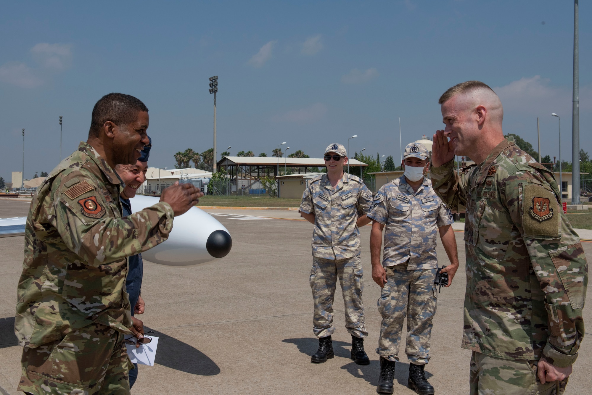 U.S. Air Force Maj. Gen. Randall Reed, 3rd Air Force commander, greets U.S. Air Force Col. Randy Oakland, 39th Air Base Wing commander during a visit to Incirlik Air Base, Turkey. Reed arrived at Incirlik to visit U.S. Airmen and check on their well-being. (U.S. Air Force photo by Staff Sgt. Joshua Magbanua)