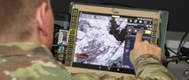 Tactical Display for Mounted Computer Environment.  Computers and software are being developed to support mobile users. (Photo Credit: U.