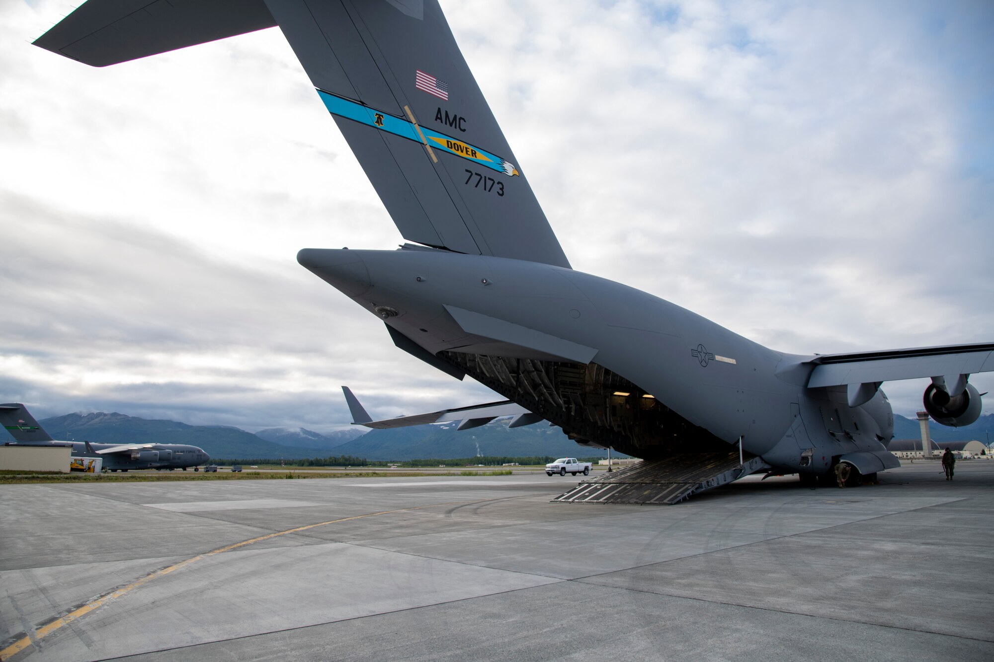 A 436th Airlift Wing C-17 Globemaster III aircraft waits on the flight line prior to takeoff during Operation Colony Glacier June 29, 2020, at Joint Base Elmendorf-Richardson, Alaska. A crew from Dover Air Force Base flew to JBER to return remains found during Operation Colony Glacier 2020, a recovery effort of remains, personal effects and aircraft wreckage from a 1952 C-124 Globemaster II aircraft crash on Mount Gannett’s Colony Glacier, in Alaska’s Chugach Range. (U.S. Air Force photo by Tech. Sgt. Esteban Esquivel)
