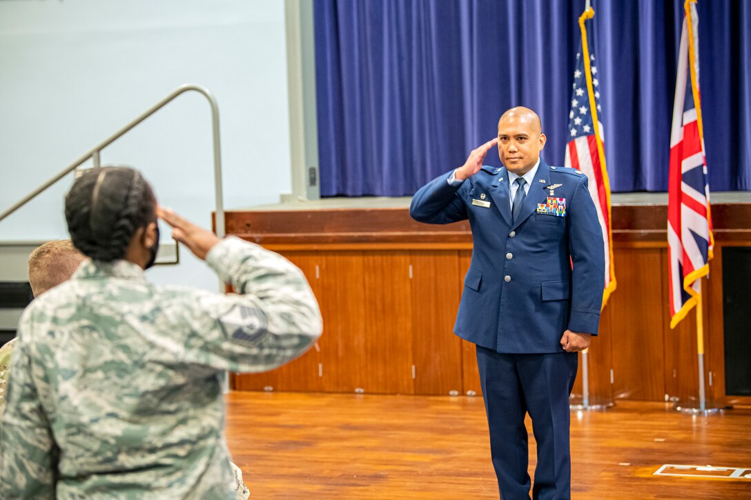 U.S. Air Force Lt. Col. Dino Quijano, 422d Medical Squadron incoming commander, salutes Airmen from the 422d Medical Squadron, after assuming command of the squadron, at RAF Croughton, July 7, 2020. Quijano previously served as the 11th Medical Operations Squadron Family Health Clinic Flight Commander at Malcolm Grow Medical Clinics and Surgery Center, Joint Base Andrews, Md. (U.S Air Force photo by Senior Airman Eugene Oliver)
