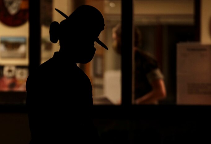 A drill instructor prepares to initiate "Lights" - the start of her platoon's morning routine - on Parris Island, S.C. July 7.