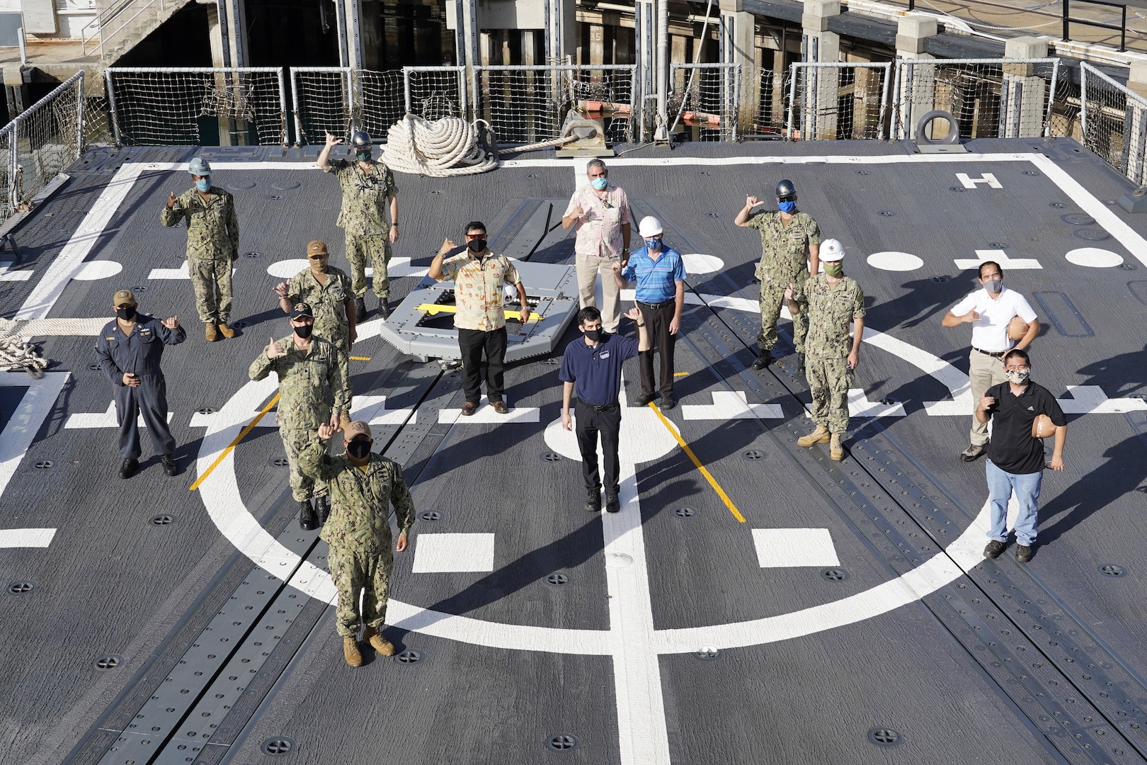 Members of the RAST repair team on USS Michael Murphy (DDG-112) with the newly-installed coating.