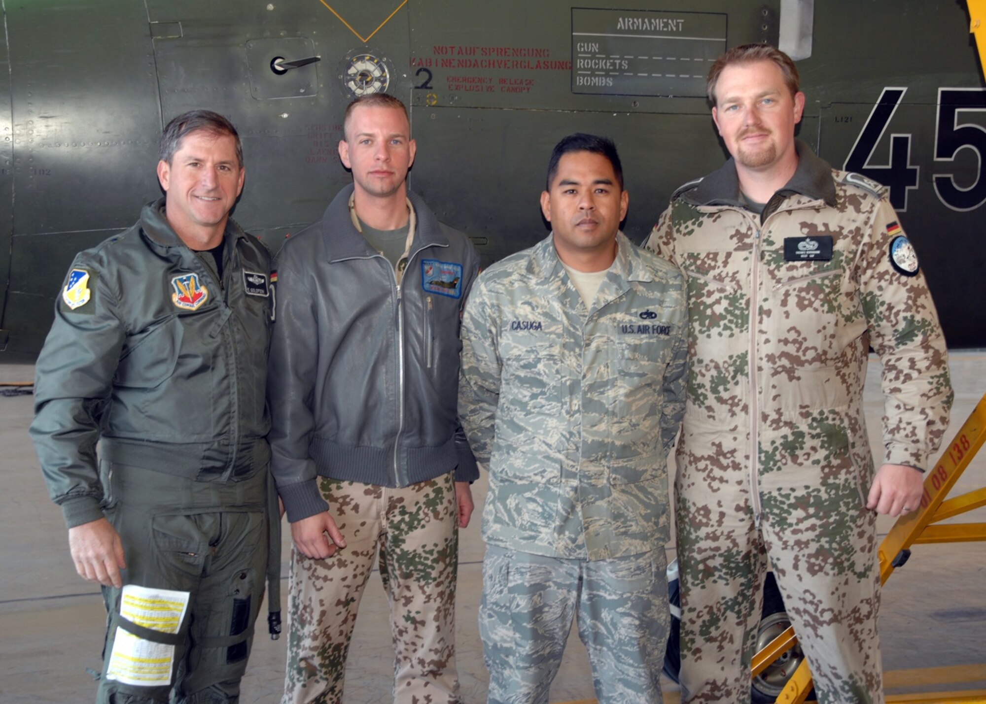 (from left to right) Brig. Gen. David Goldfein, 49th Fighter Wing commander, Staff Sgt. Bartos Trojca, 1st Line Maintenance Squadron, Staff Sgt. Romeo Casuga, 49th Aircraft Maintenance Squadron, and Master Sgt. Thomas Bornmann, 1st Line Maintenance Squadron, pose for a photo after a successful flight in the German Tornado by Goldfein, Dec. 14, 2007, at Holloman Air Force Base, N.M. Staff Sgt. Trojca, Staff Sgt. Casuga, and Master Sgt. Bornmann were the maintainers for Goldfein's first flight in the Tornado. (U.S. Air Force photo/Airman 1st Class Jamal D. Sutter)