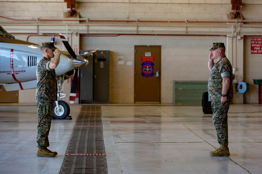 Col. Charles E. Dudik assumes command of Marine Corps Air Station (MCAS) Yuma during a change of command ceremony at the search and rescue (SAR) hanger aboard MCAS Yuma, July 6, 2020.