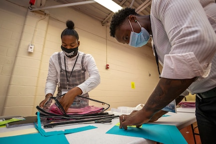 U.S. Army Spc. Janerah W. Glaze, left, and Spc. Marie F. Mathurin, both with the 253rd Transportation Company, New Jersey Army National Guard, prepare provisional ballot bags at the superintendent of elections, Atlantic County, Northfield, N.J., July 7, 2020. More than 100 New Jersey Army National Guard Soldiers assisted election officials in seven counties by performing duties related to the state’s Primary Election.