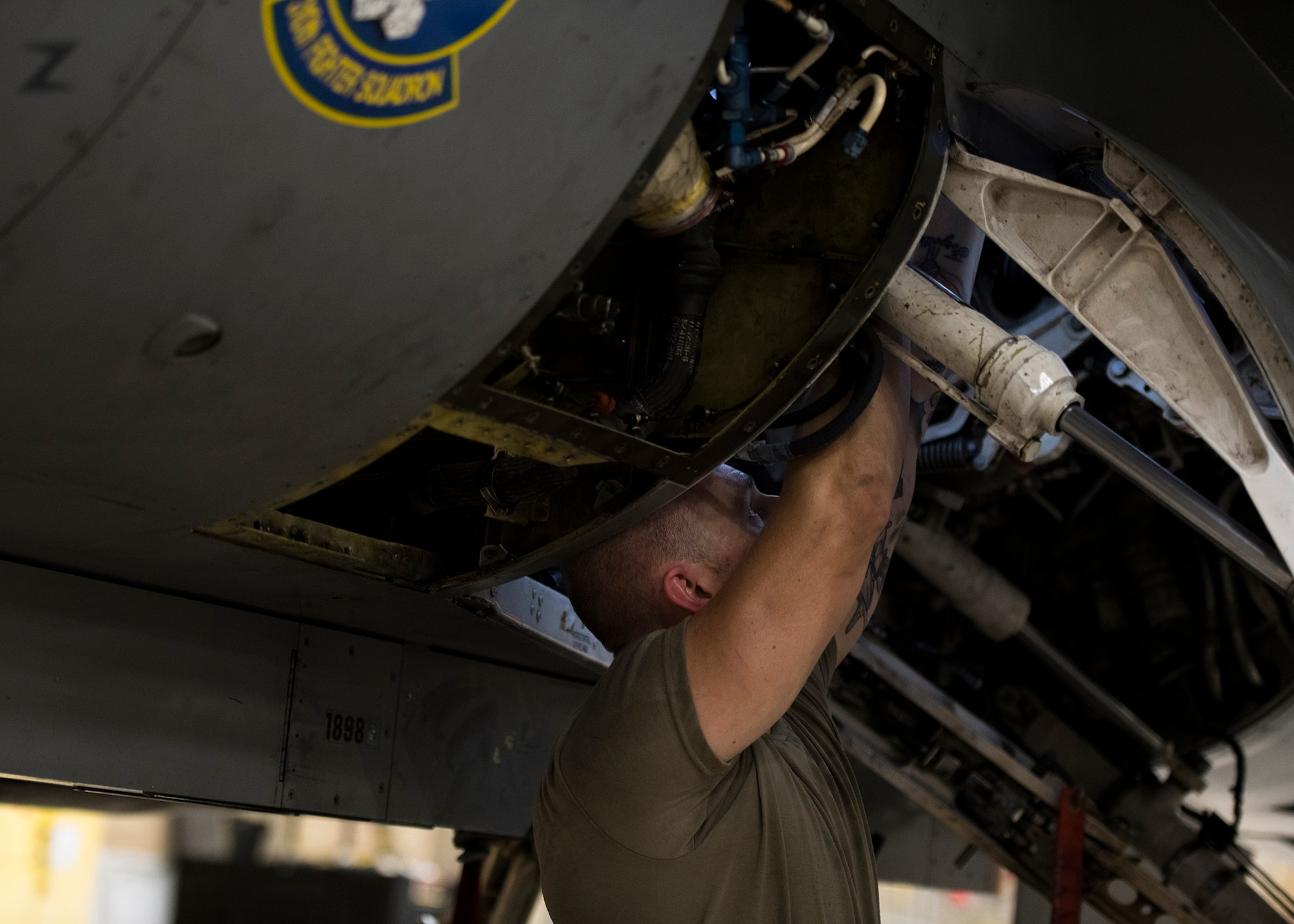 Staff Sgt. Timothy Clark, 310th Aircraft Maintenance Unit avionics technician, maintains an F-16D Fighting Falcon, June 24, 2020, at Luke Air Force Base, Ariz.
