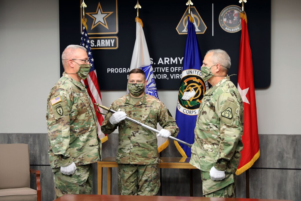 Sgt. Maj. Vern Daley is welcomed as Program Executive Office (PEO) Soldier’s Sergeant Major at the Assumption of Responsibility ceremony at Fort Belvoir, Va on 19 June 2020. 
Master Sgt. Marc Krugh, former Senior Enlisted Advisor to PEO Soldier, initiated the ceremony with the passing of the Noncommissioned Officer sword.