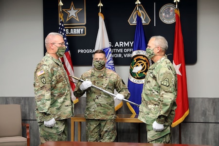Sgt. Maj. Vern Daley is welcomed as Program Executive Office (PEO) Soldier’s Sergeant Major at the Assumption of Responsibility ceremony at Fort Belvoir, Va on 19 June 2020. 
Master Sgt. Marc Krugh, former Senior Enlisted Advisor to PEO Soldier, initiated the ceremony with the passing of the Noncommissioned Officer sword.