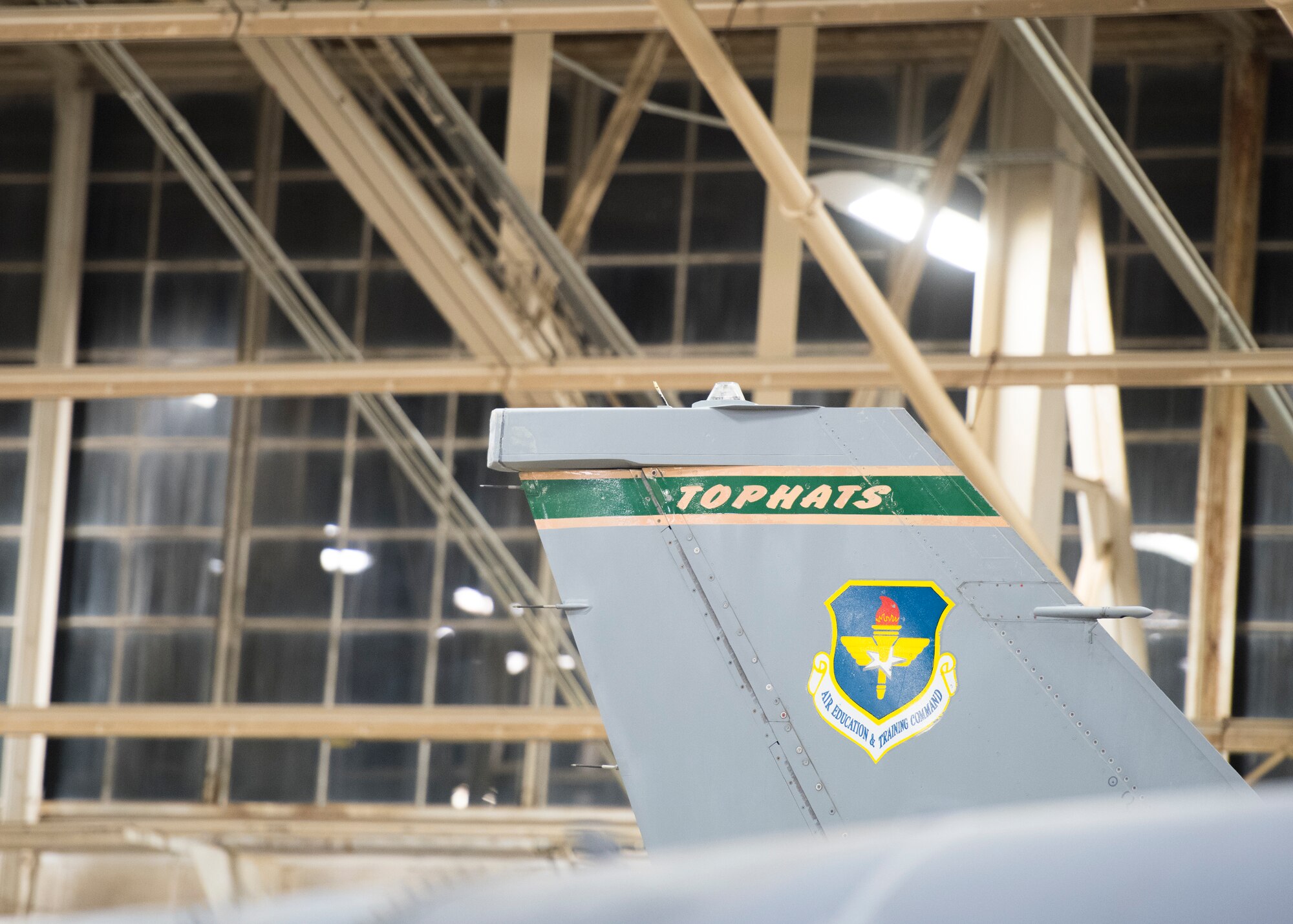 An F-16 Fighting Falcon assigned to the 310th Fighter Squadron “Tophats” sits in a hangar June 24, 2020, at Luke Air Force Base, Ariz.