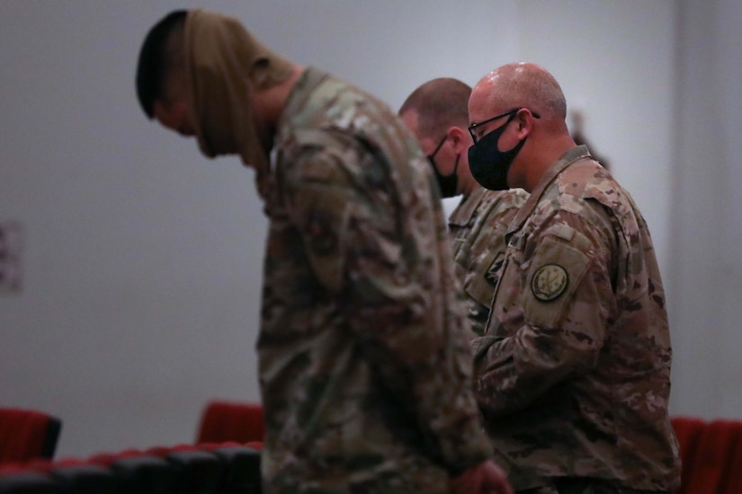 Soldiers attend worship service.