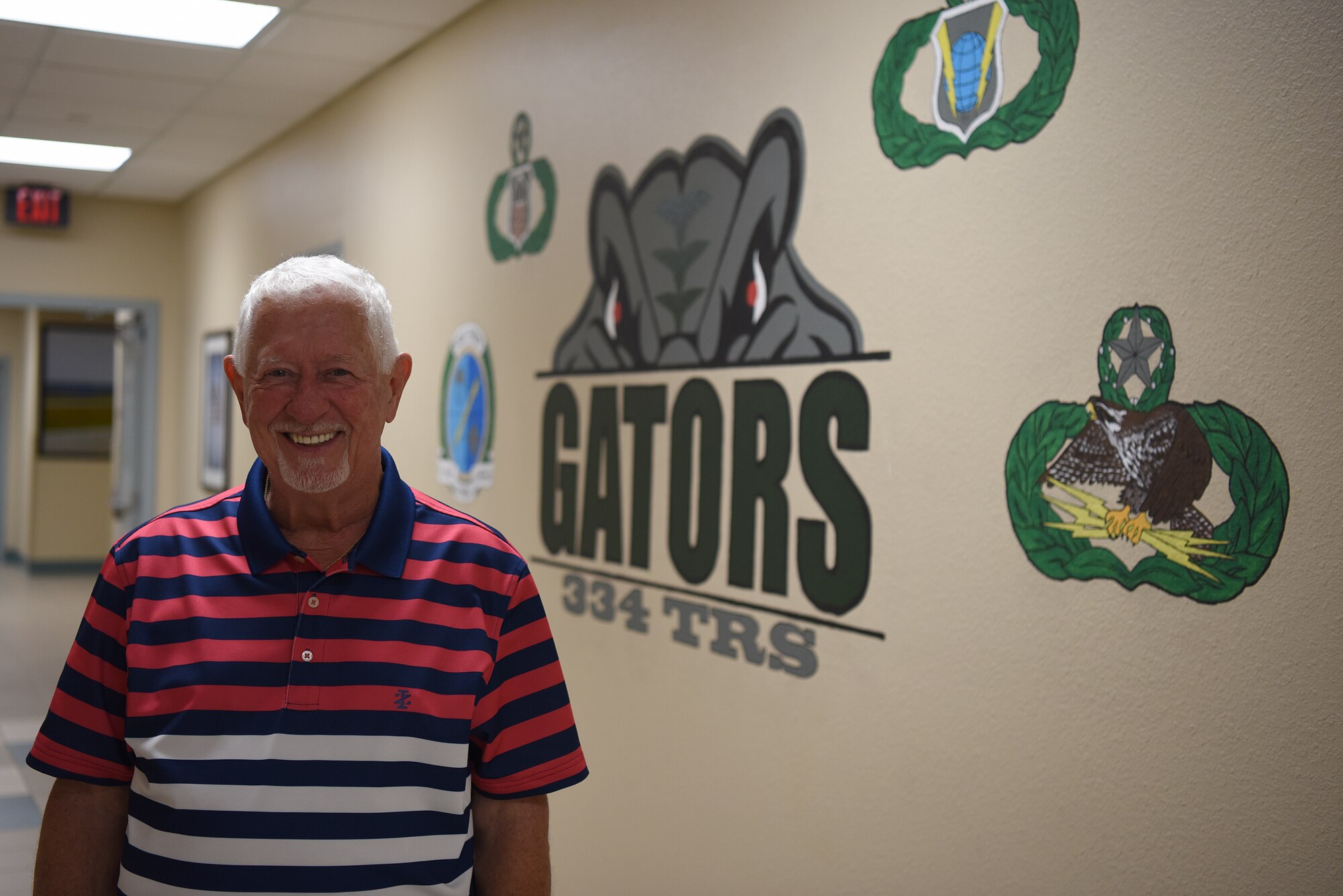 Jim Bailey, 334th Training Squadron air traffic control instructor, poses for a photo inside Cody Hall at Keesler Air Force Base, Mississippi, July 8, 2020. Bailey served in the Air Force as an air traffic controller from 1961-1966 and then at the age of 76 he earned his associate's degree so he could become an air traffic control instructor. (U.S. Air Force photo by Senior Airman Suzie Plotnikov)