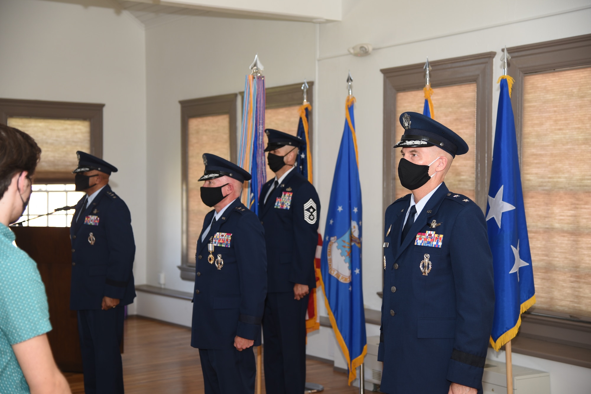 Lt. Gen. Anthony Cotton, Maj. Gen. Ferdinand B. Stoss and Maj. Gen. Michael Lutton stand during the 20th Air Force change of command ceremony, 8 July, 2020, F. E. Warren Air Force Base, Wyo. During the ceremony, Maj. Gen. Michael J. Lutton took command of 20th Air Force from Maj. Gen. Ferdinand “Fred” B. Stoss. (U. S. Air Force photo by Glenn S. Robertson)