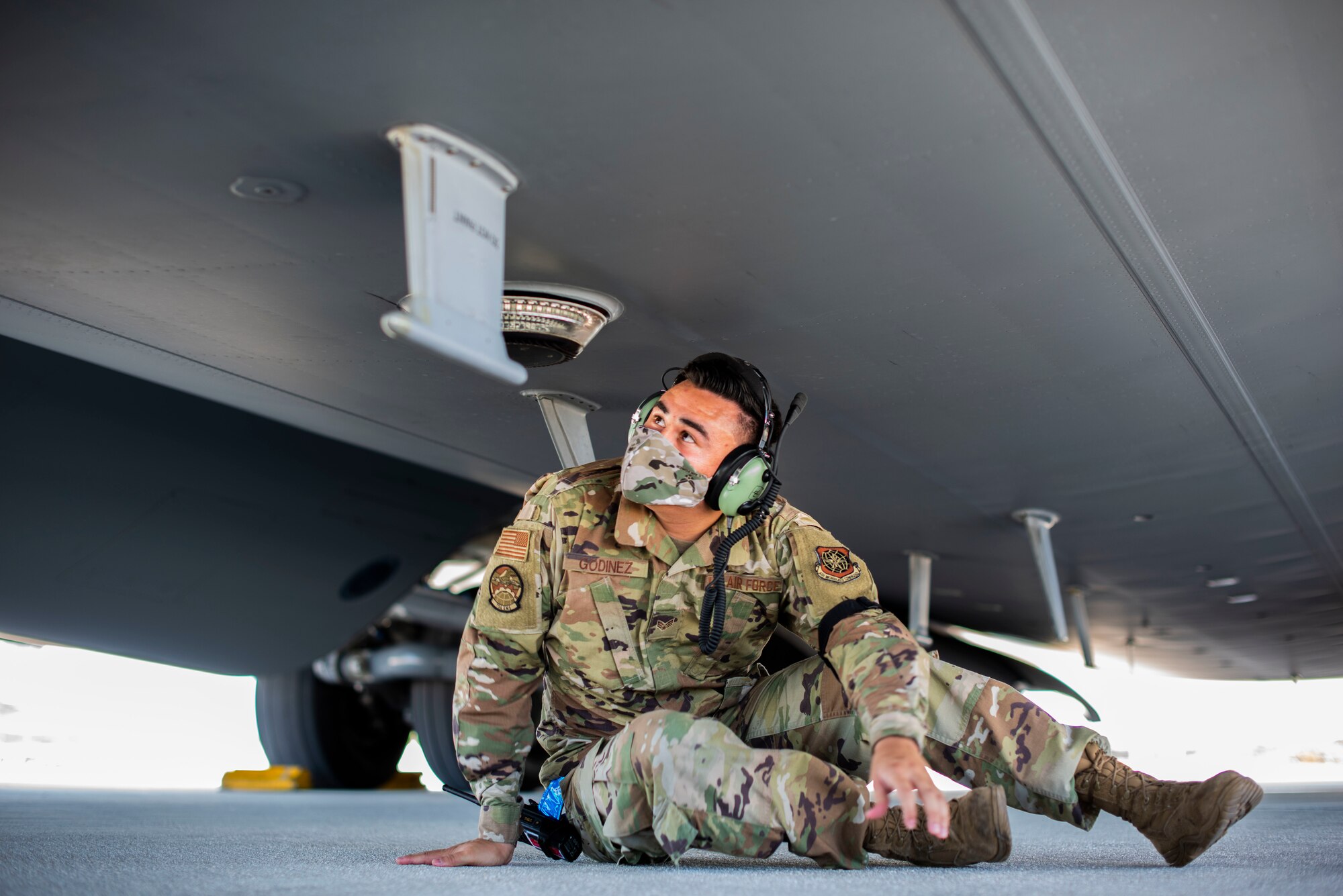 U.S. Air Force Senior Airman Luis Godinez, 734th Air Mobility Squadron crew chief, inspects a C-17 Globemaster assigned to the 154th Wing, Hawaii Air National Guard, after a Joint Forcible Entry Operation (JFEO) jump into Andersen Air Force Base, Guam, June 30.