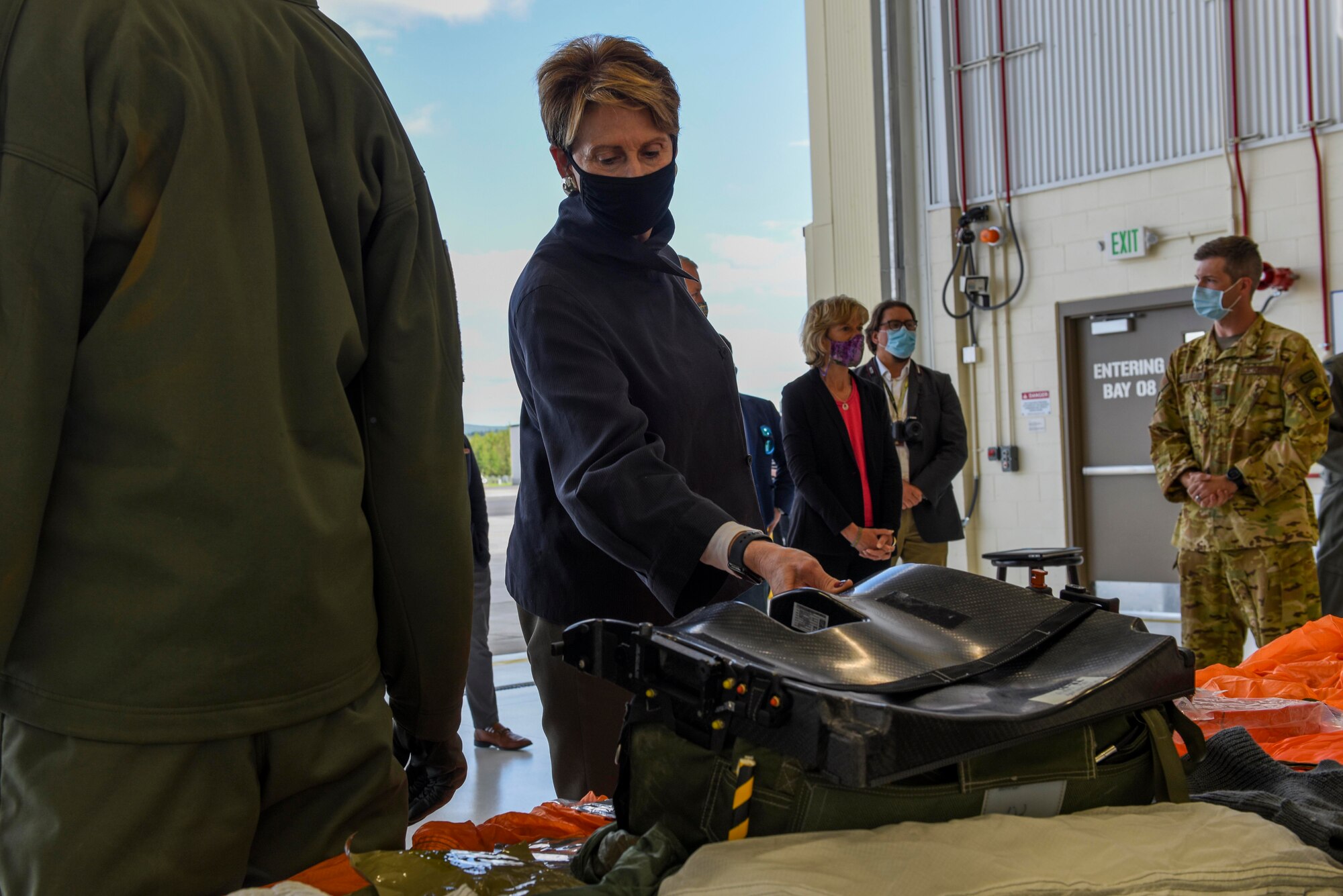Secretary of the Air Force Barbara M. Barrett looks at the contents of an F-35A Lightning II Arctic seat kit during her visit to Eielson Air Force Base, Alaska, July 7, 2020. Barrett focused her visit on exploring arctic capabilities found only at the U.S. Air Force’s northern-most fighter wing. (U.S. Air Force photo by Airman 1st Class Aaron Larue Guerrisky)