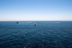 200618-N-KZ419-1010 ARABIAN GULF (June 18, 2020) Ships from Saudi Arabia, the U.K, and U.S. sail in formation during a mine countermeasures interoperability exercise in the U.S. 5th Fleet area of operations. The 5th Fleet area of operations encompasses about 2.5 million square miles of water area and includes the Arabian Gulf, Gulf of Oman, Red Sea and parts of the Indian Ocean. The expanse is comprised of 20 countries and includes three chokepoints, critical to the free flow of global commerce. (U.S. Navy photo by Mass Communication Specialist 3rd Class Dawson Roth)