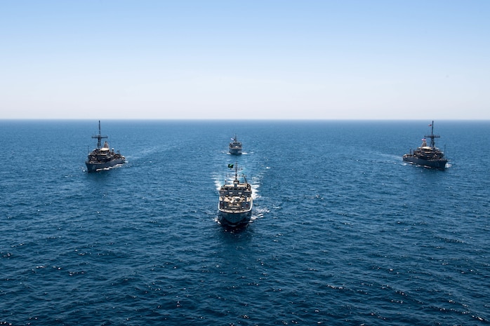 200618-N-KZ419-1007 ARABIAN GULF (June 18, 2020) Ships from Saudi Arabia, the U.K, and U.S. sail in formation during a mine countermeasures interoperability exercise in the U.S. 5th Fleet area of operations. The 5th Fleet area of operations encompasses about 2.5 million square miles of water area and includes the Arabian Gulf, Gulf of Oman, Red Sea and parts of the Indian Ocean. The expanse is comprised of 20 countries and includes three chokepoints, critical to the free flow of global commerce. (U.S. Navy photo by Mass Communication Specialist 3rd Class Dawson Roth)
