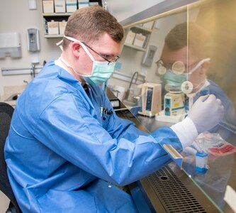 Army Spc. David Pyke, medical laboratory technician, loads a patient sample for rapid COVID-19 polymerase chain reaction testing at Brooke Army Medical Center at Joint Base San Antonio-Fort Sam Houston April 9.