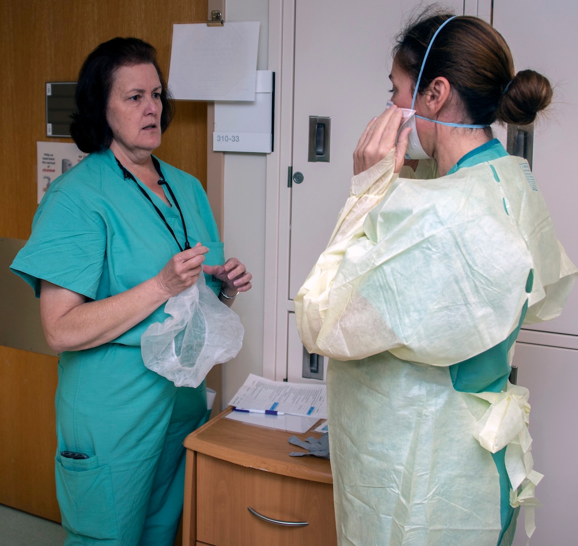 Donning personal protective equipment