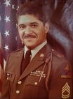 Rafael Santos poses for his official photo as a sergeant first class, shortly before commissioning as a warrant officer in 1986. Santos served as a warrant officer for 15 years during his 28 years of active duty service. Now Santos uses the expertise in human resources he gained during his time in uniform as a civilian at the U.S. Army Space and Missile Defense Command. (Courtesy photo)