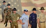 Ten Military Training Instructors from the 37th Training Wing donned legacy Air Force uniforms, dating from 1947 to the present, as they posed for a photographer at the Airman Heritage Museum on Joint Base San Antonio-Lackland June 24 to help create a new mural to decorate the walls of the Military Training Instructor Schoolhouse.