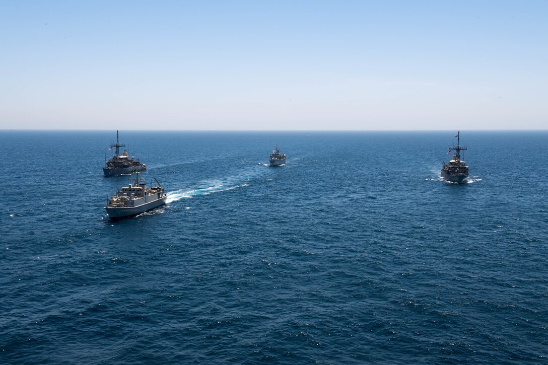 200618-N-KZ419-1009 ARABIAN GULF (June 18, 2020) Ships from Saudi Arabia, the U.K, and U.S. sail in formation during a mine countermeasures interoperability exercise in the U.S. 5th Fleet area of operations. The 5th Fleet area of operations encompasses about 2.5 million square miles of water area and includes the Arabian Gulf, Gulf of Oman, Red Sea and parts of the Indian Ocean. The expanse is comprised of 20 countries and includes three chokepoints, critical to the free flow of global commerce. (U.S. Navy photo by Mass Communication Specialist 3rd Class Dawson Roth)