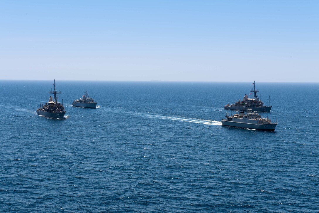 200618-N-KZ419-1006 ARABIAN GULF (June 18, 2020) Ships from Saudi Arabia, the U.K, and U.S. sail in formation during a mine countermeasures interoperability exercise in the U.S. 5th Fleet area of operations. The 5th Fleet area of operations encompasses about 2.5 million square miles of water area and includes the Arabian Gulf, Gulf of Oman, Red Sea and parts of the Indian Ocean. The expanse is comprised of 20 countries and includes three chokepoints, critical to the free flow of global commerce. (U.S. Navy photo by Mass Communication Specialist 3rd Class Dawson Roth)