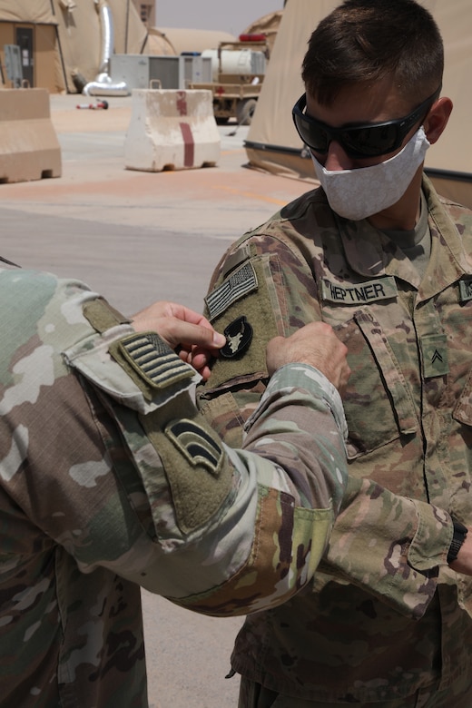 U.S. Army Soldiers assigned to Task Force Javelin were awarded the Shoulder Sleeve Insignia  of the 34th "Red Bull" Infantry Division on July 2, 2020 in the Kingdom of Saudi Arabia. The SSI was awarded to 21 members of TFJ for their service in a designated combat zone. (U.S. Army National Guard photo by Sgt. Trevor Cullen)