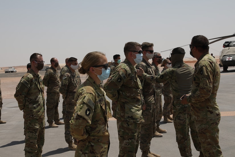 U.S. Army Soldiers assigned to Task Force Javelin were awarded the Shoulder Sleeve Insignia  of the 34th "Red Bull" Infantry Division on July 2, 2020 in the Kingdom of Saudi Arabia. The SSI was awarded to 21 members of TFJ for their service in a designated combat zone. (U.S. Army National Guard photo by Sgt. Trevor Cullen)