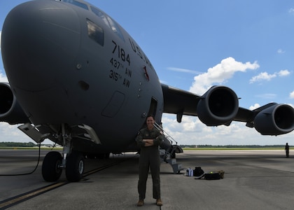 Capt. Ana Ekhaus, a C-17 Globemaster III pilot assigned to the 15th Airlift Squadron at Joint Base Charleston, S.C., stands in front of a C-17 prior to conducting a local pattern-only flight over S.C., June 24, 2020. Capt. Ekhaus conducted “touch and go’s” at Myrtle Beach International Airport, S.C. and GOAT’s, or go out again training, at Joint Base Charleston’s North Auxiliary Field, S.C.. The flight was part of her upgrade training as she prepares to go to C-17 Globemaster III aircraft commander school at Altus AFB, Okla..