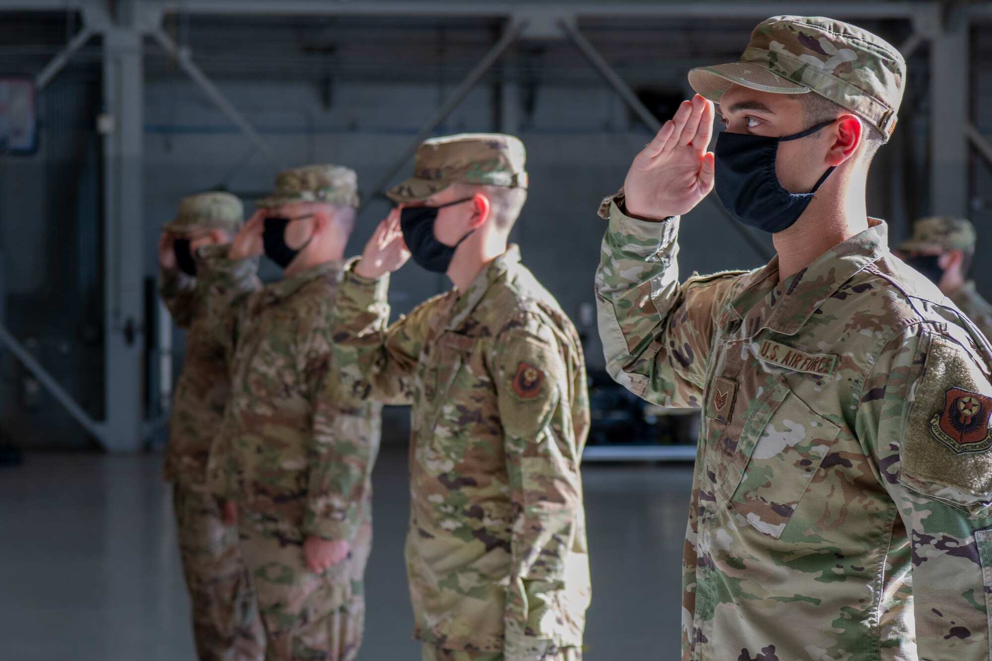 Air Commandos with the 1st Special Operations Munitions Squadron render a salute during the 1st SOMUNS activation ceremony at Hurlburt Field, Florida, July 8, 2020.